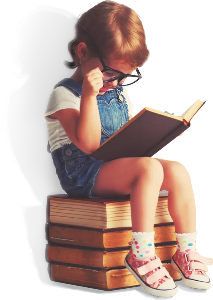 Old time photo of girl sitting on books reading